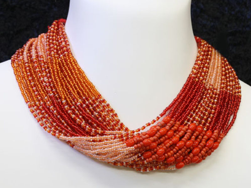 Red, orange with fancy bead accents Red, orange with fancy bead accents