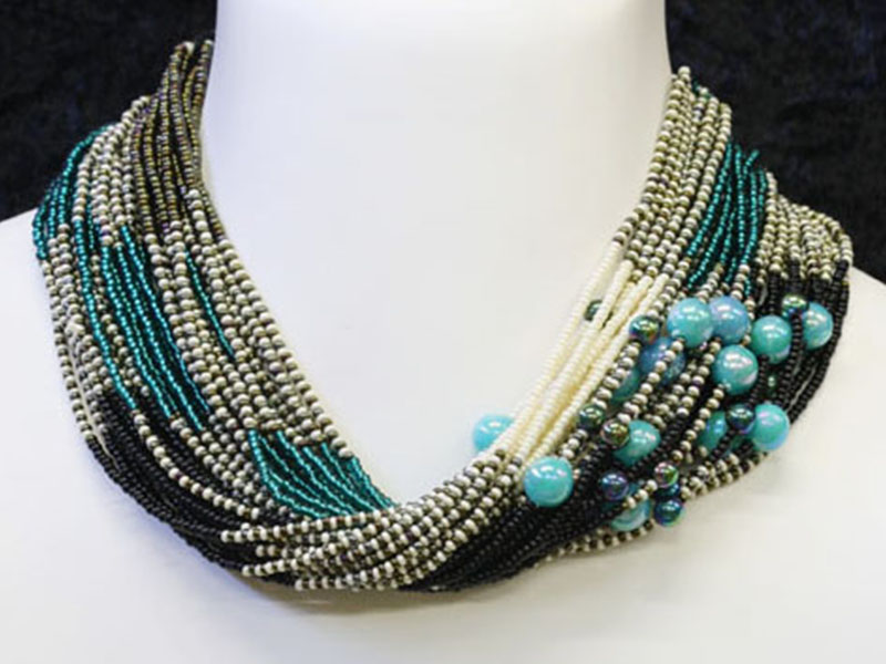 Black, cream , turquoise with fancy accent beads Black, cream , turquoise with fancy accent beads