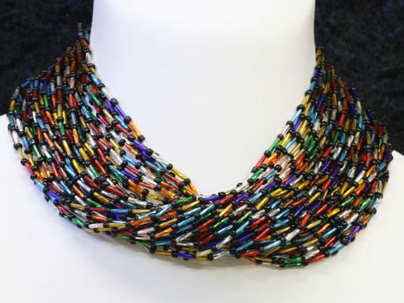Multi colour tube beads with black beads Multi colour tube beads with black beads