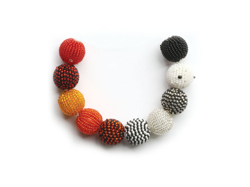 Black, white and reds and orange Black, white and reds and orange